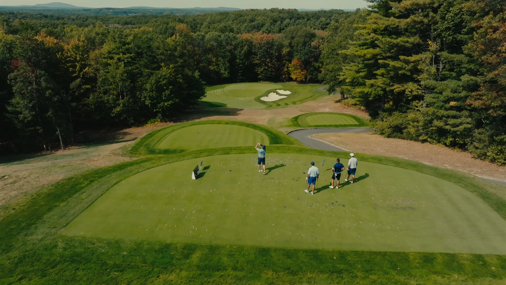 Aerial view of championship golf course at twilight